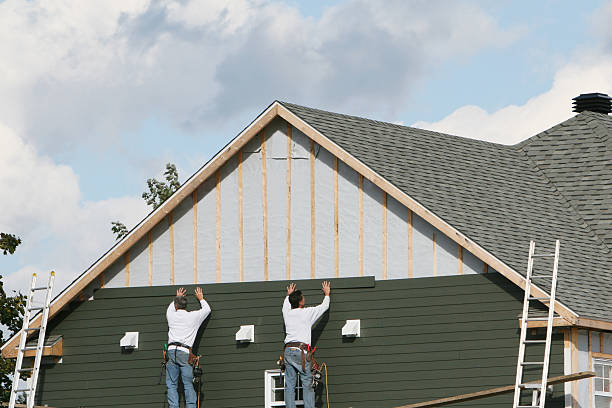Professional Siding Installation technician working in Wellsburg, WV